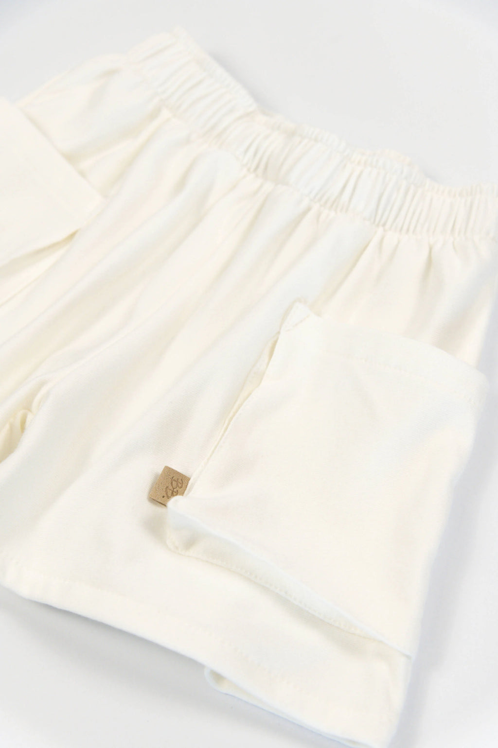 Short bimba con tasche