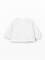 Blusa con apertura incrociata
