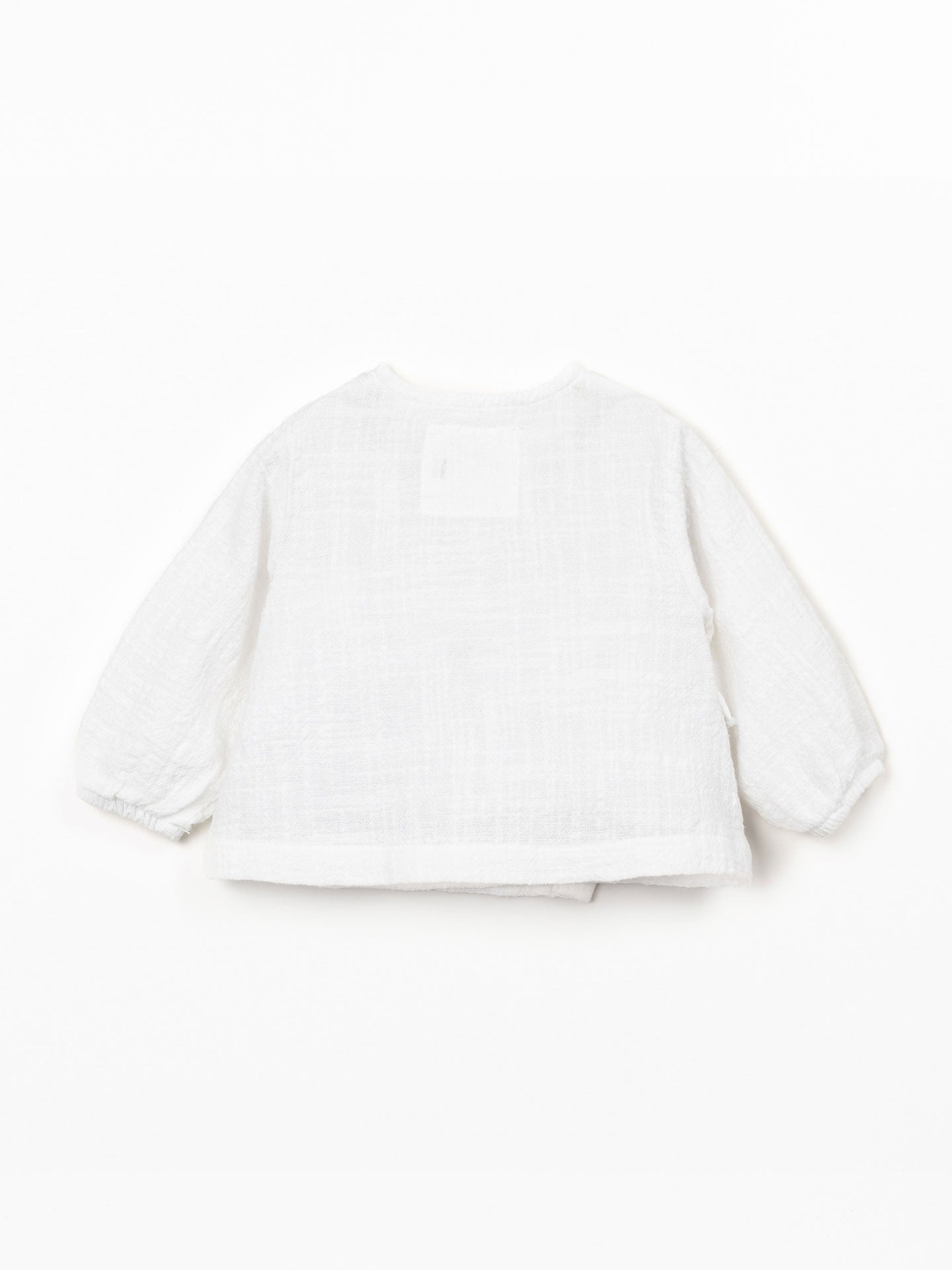 Blusa con apertura incrociata