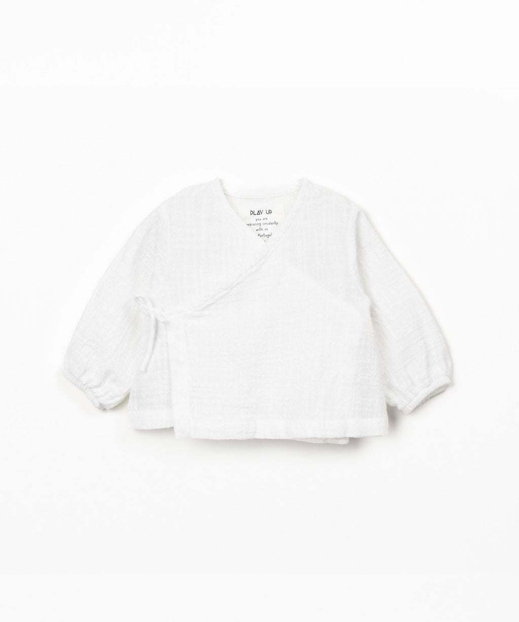 Blusa con apertura incrociata