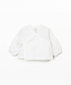 Blusa con apertura incrociata