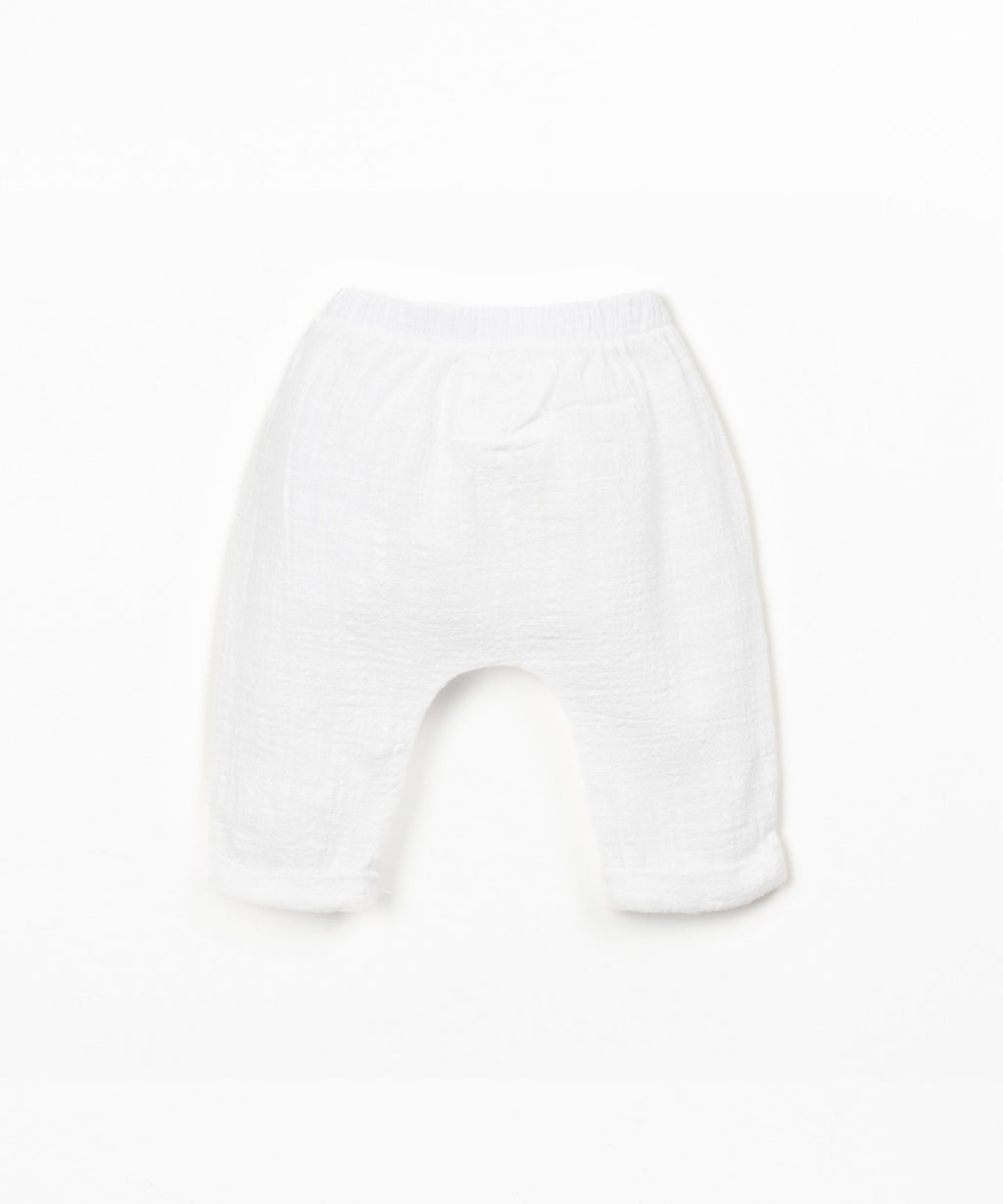 Pantaloni in tessuto con bottone decorativo in cocco